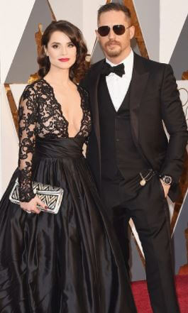 Elizabeth Anne Hardy son Tom Hardy with Charlotte Frances Riley in an event.